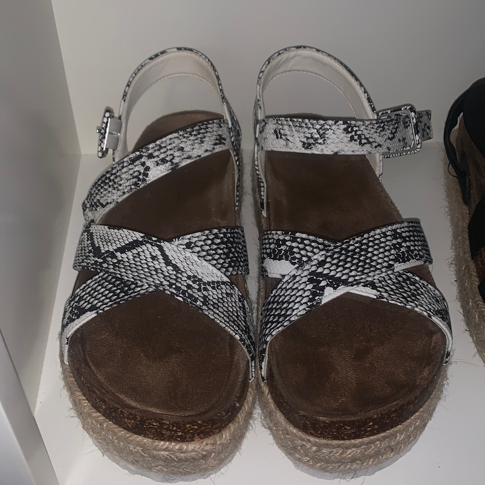 Snake platform sandals